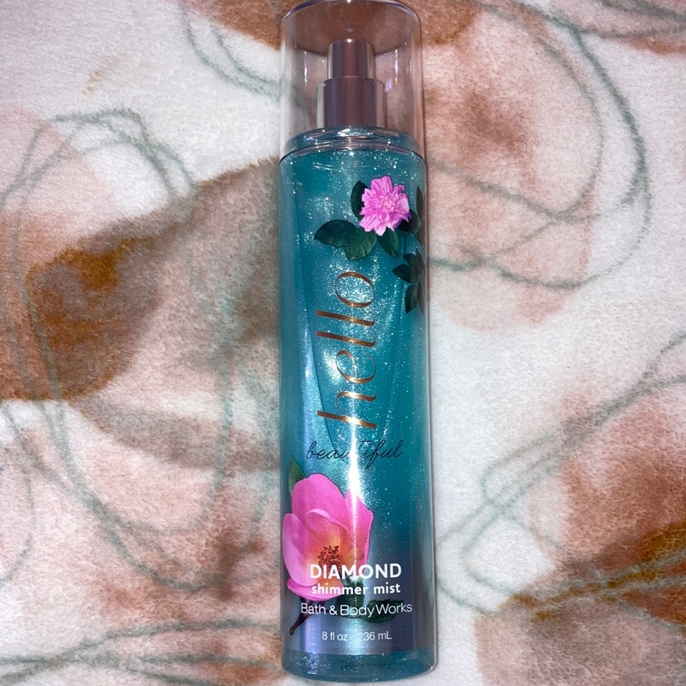 “hello beautiful” shimmer spray from Bath & Body Works, only used once!